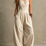 ADRIANA – Elegáns Jumpsuit keresztbe tett dekoltázzsal
